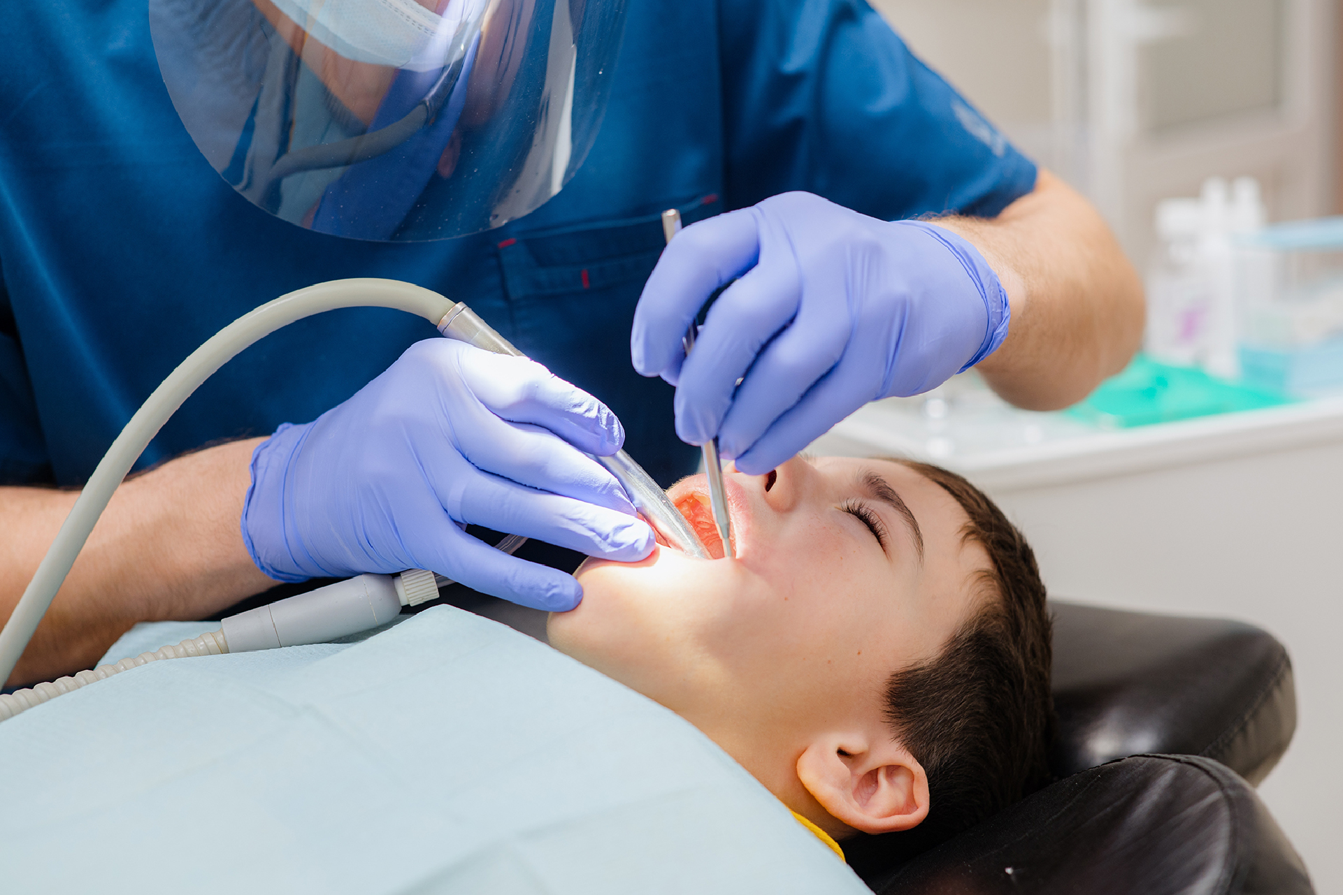 Treating tooth decay with composite fillings at Bloom Family Dental in Sheboygan, Wisconsin.